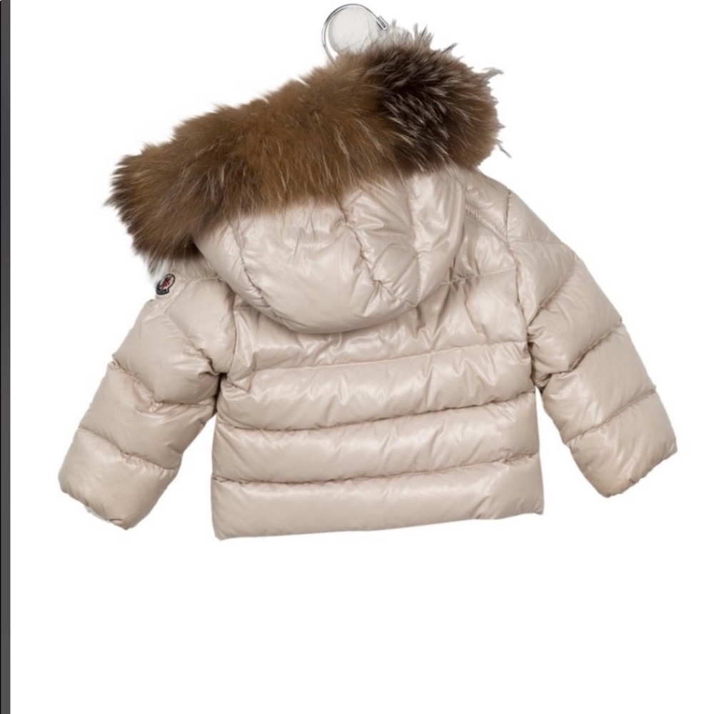 Infant Moncler, Slightly worn . Cream colored , size 9-12 months .